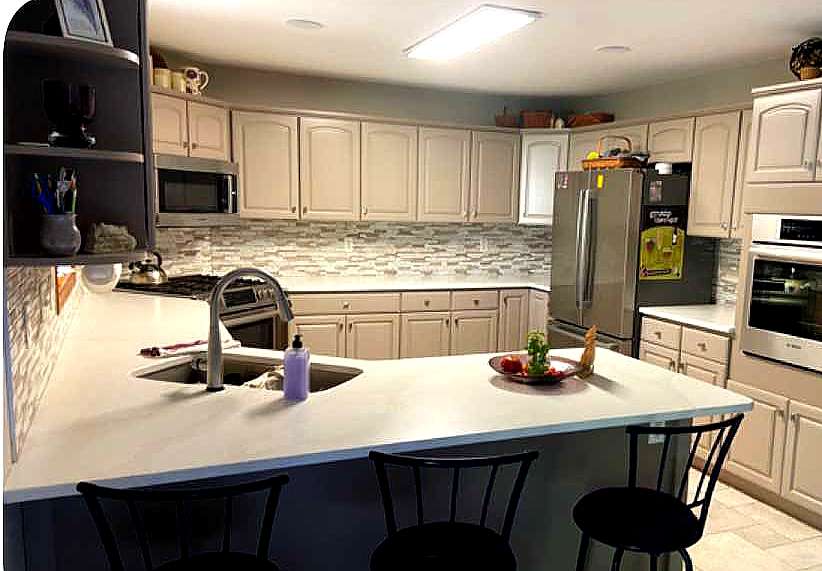 Stunning Tile Backsplash Installed by The Finishers of Valparaiso 27 finishers of valparaiso kicthen backlash mosaic ceramic tile painters painting white nwindiana